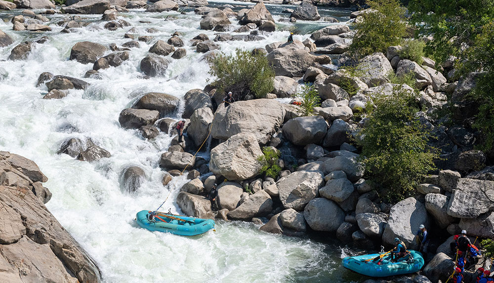 Lining boats around Lumsden Falls - Tuolumne River